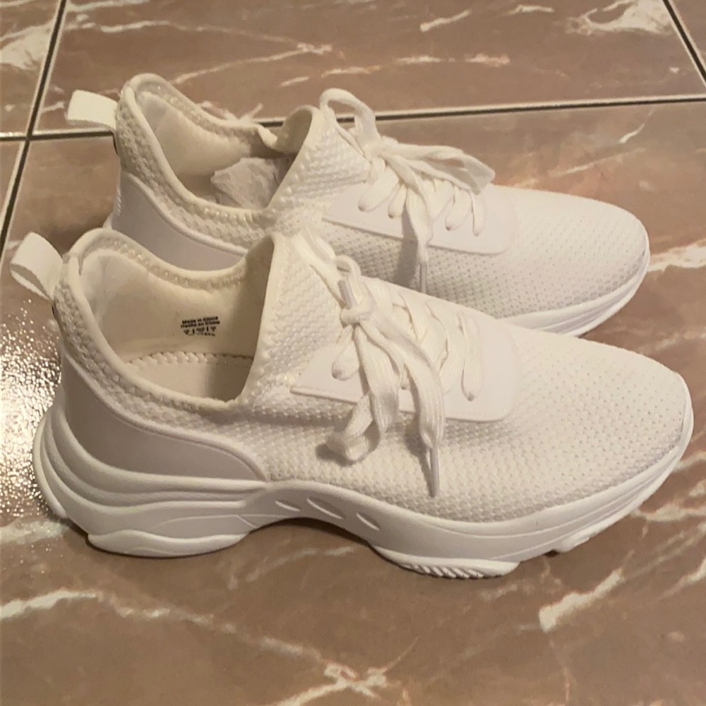 Call it spring white Lexii shoes. Brand new. US 9